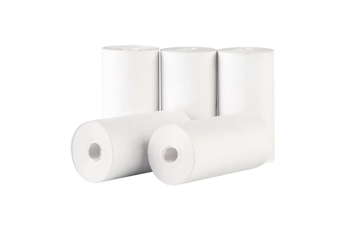 Original same-site group of unbranded white paper rolls in upright and horizontal positions